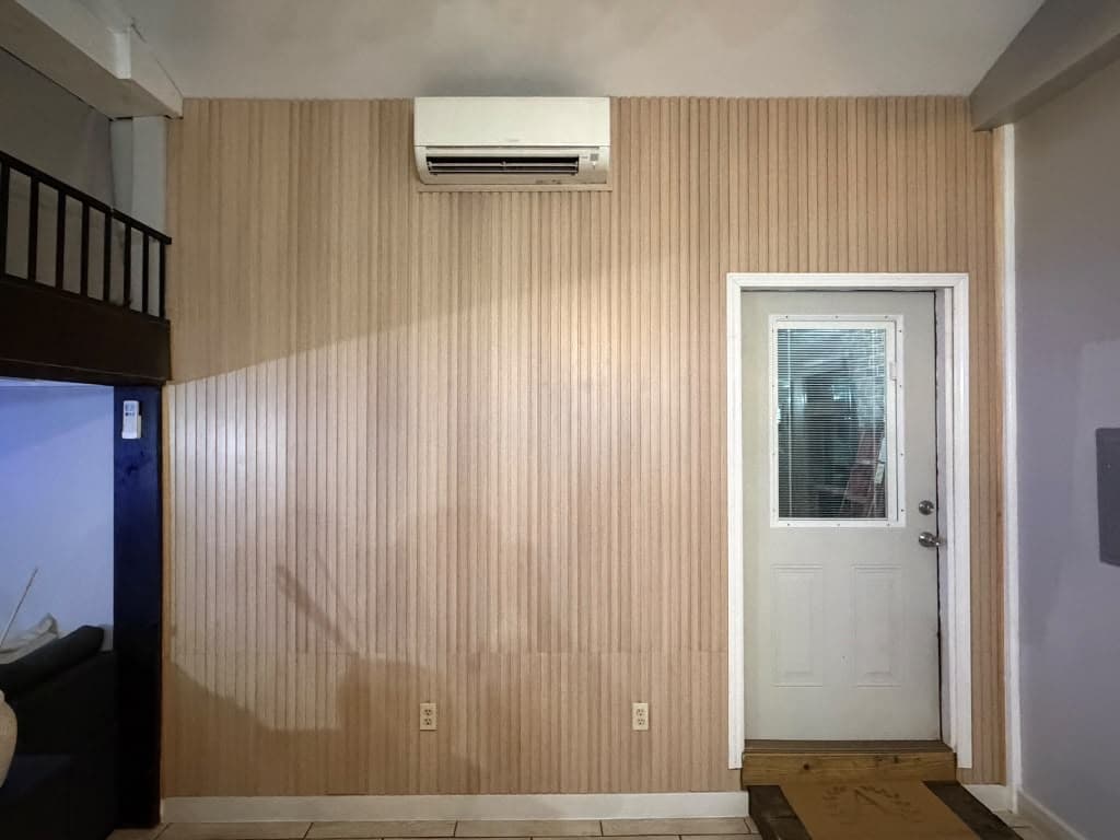Finished wood slat accent wall